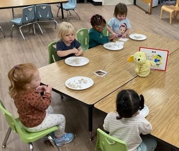 children using modeling clay to create scupltures