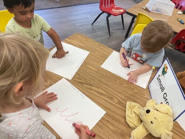 3 children drawing