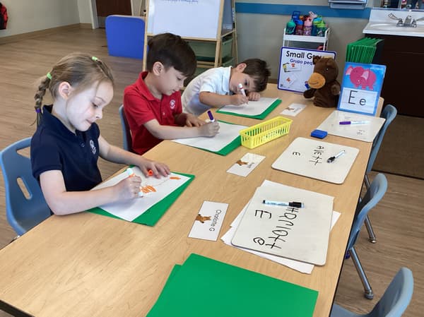 children using markers
