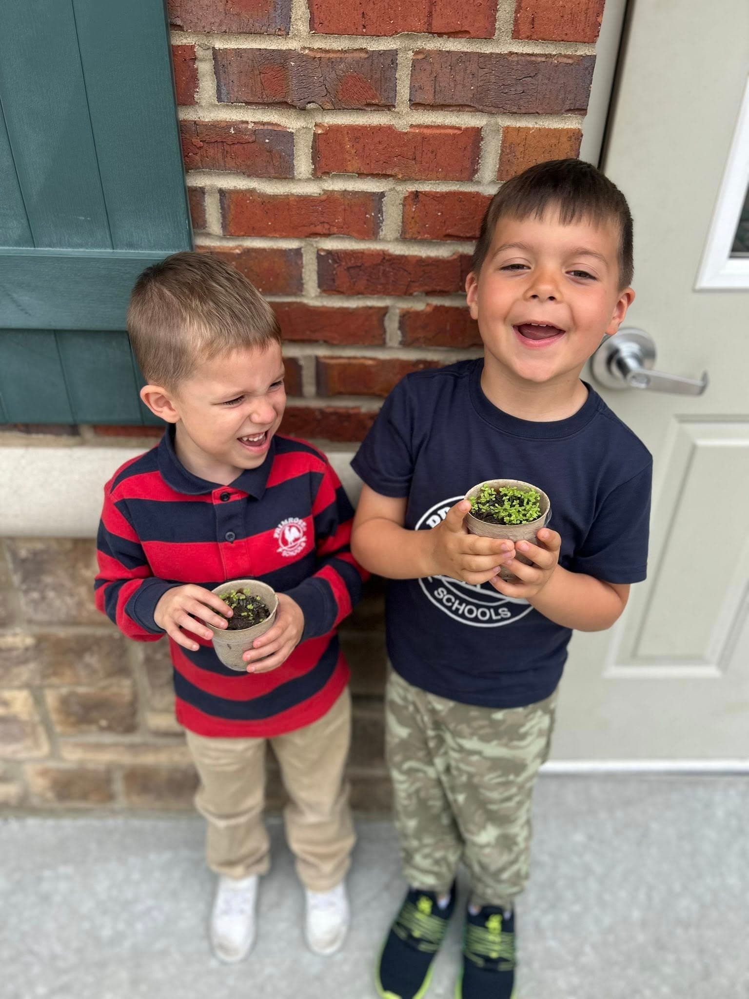 children taking a picture for Earth Day