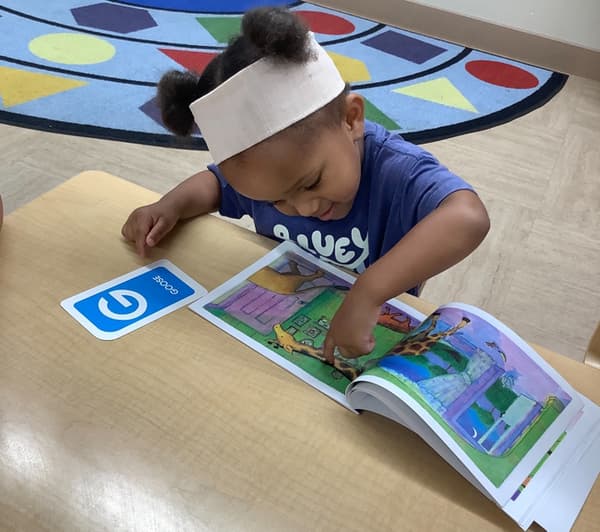 Hands-on learning centers for early childhood development a the best childcare center in fort worth. happy children and teachers.