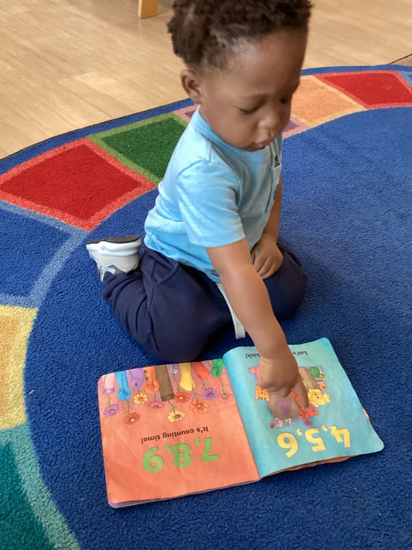 toddler classroom, reading, learning through play