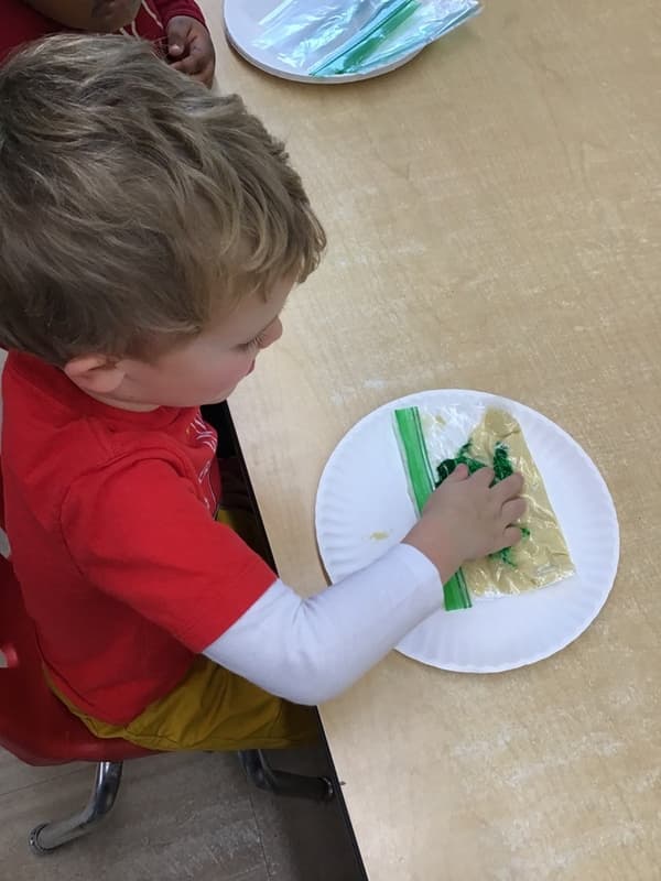 child making salt dough.