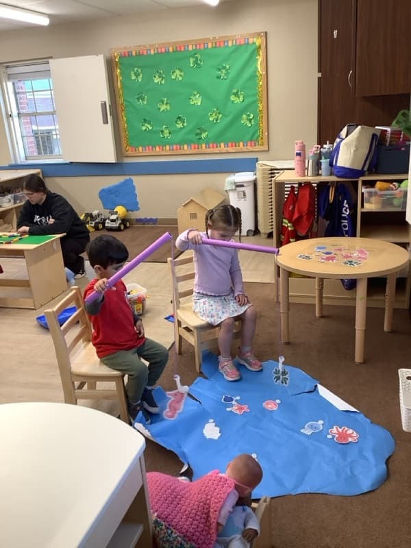 Children pretending to fish