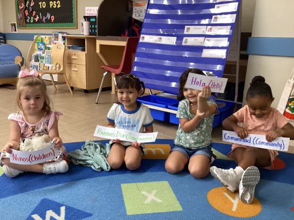 Preschool children enjoy a spanish lesson at Primrose School at Summerwood