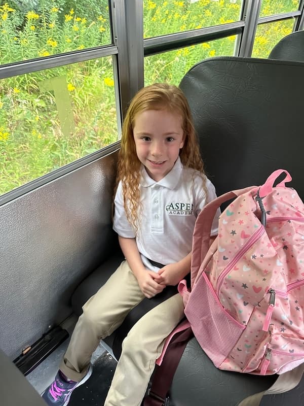 Explorer student on her way to school