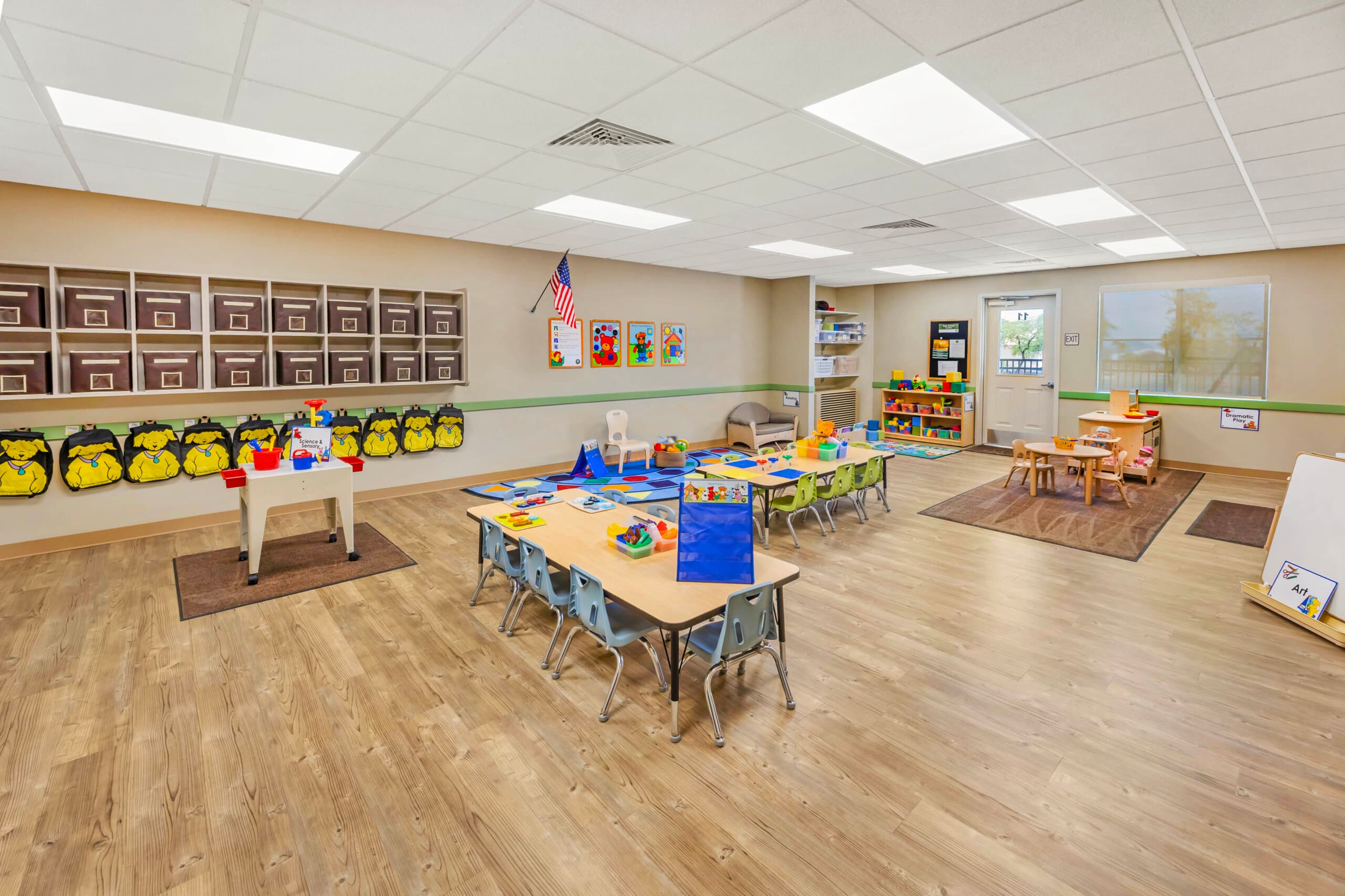 Early Preschool classroom with cute animal backpacks and classroom supplies