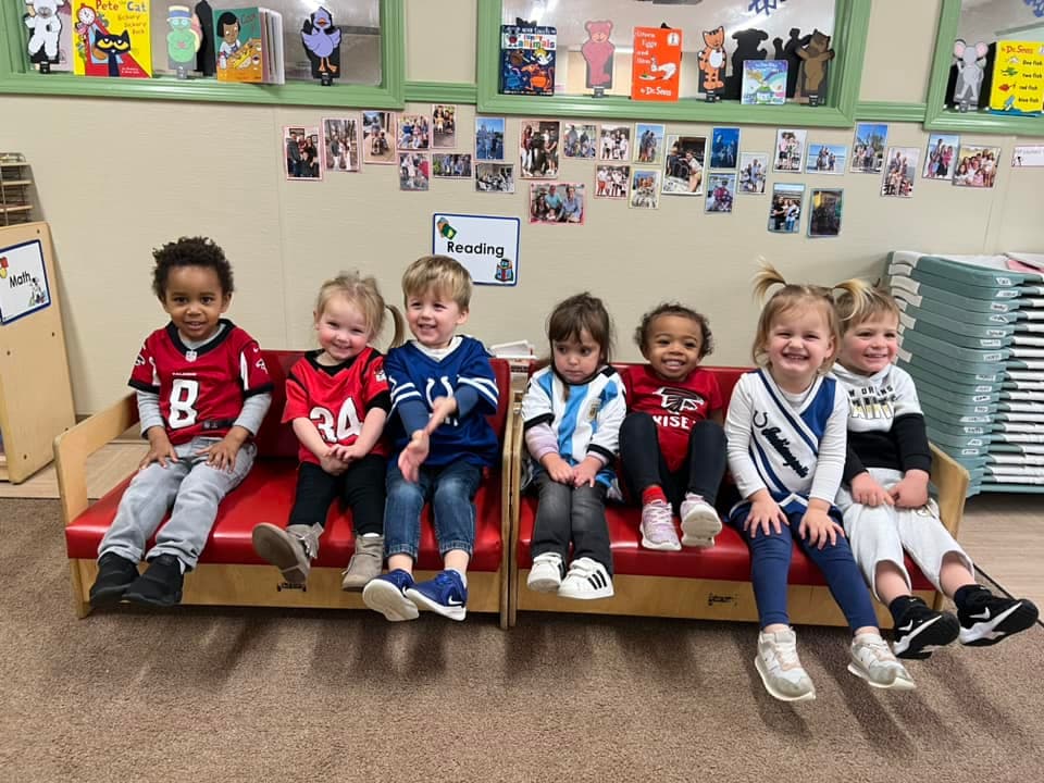 children dressed in atlanta braves merchandice