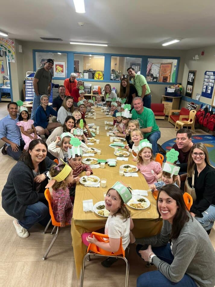children eating thanksgiving food with parents