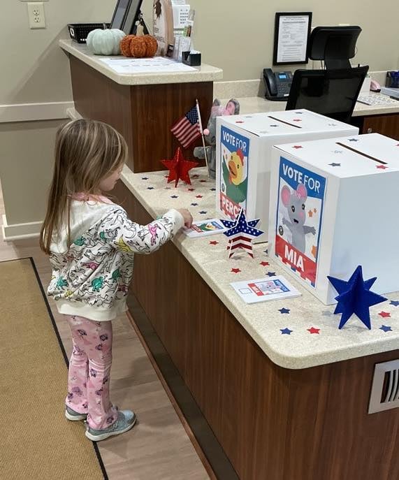Primrose students participating in a mock election, learning about civic duty and choosing between Mia and Percy.