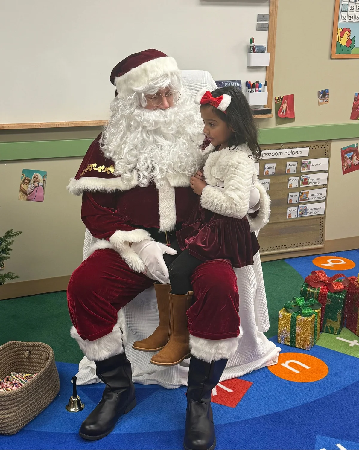 Families celebrating Winterfest with cookies, crafts, and a Santa visit at Primrose School of Fuquay-Varina.