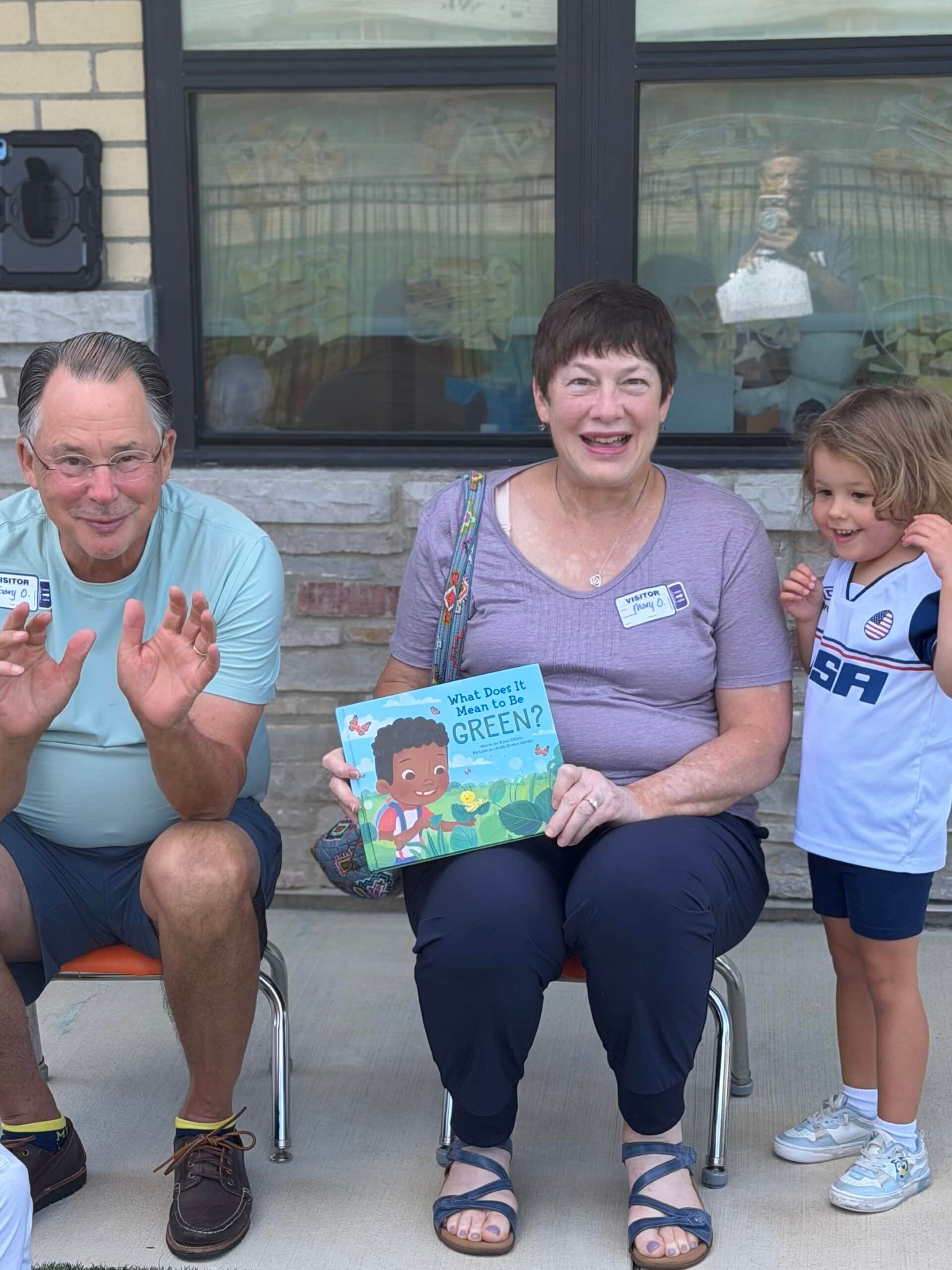Preschool student sharing a special moment with grandparents during our Grandparents Day classroom celebration and activities.