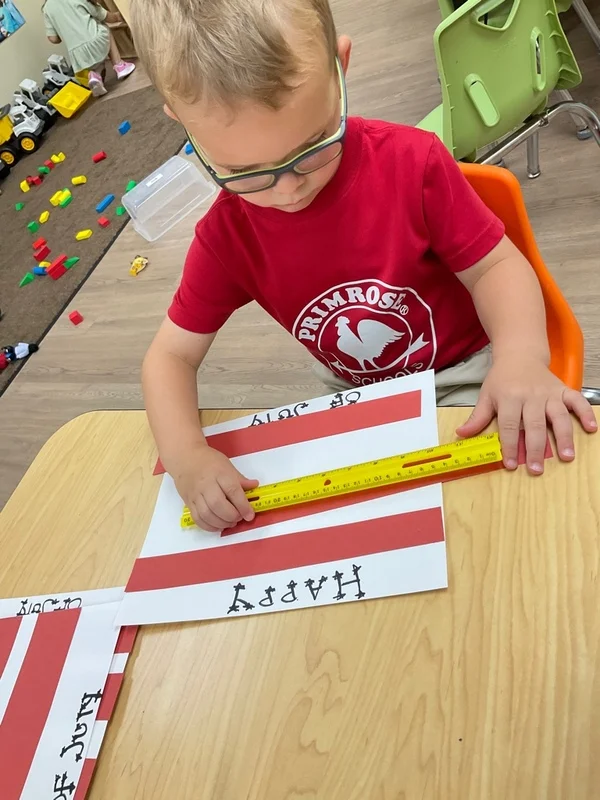 primrose waxhaw student doing 4th of july crafts