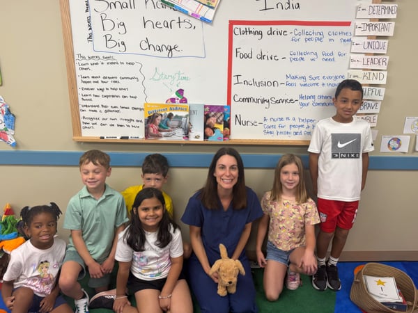 Summer adventure club students with a physician's assistant