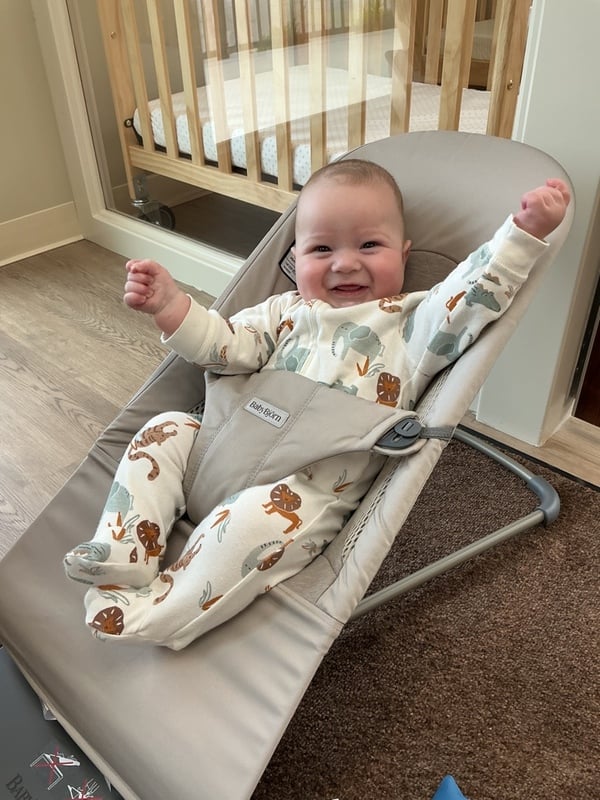 Primrose School of Clintonville Infant student happy and smiling