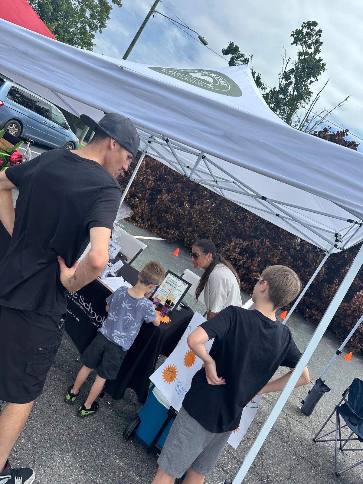 interacting with another family at the event