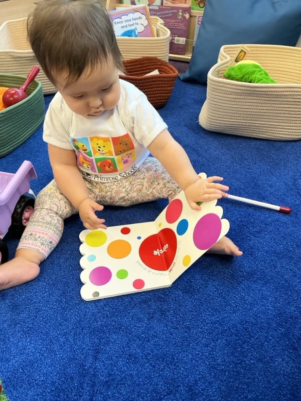 toddler girl reading