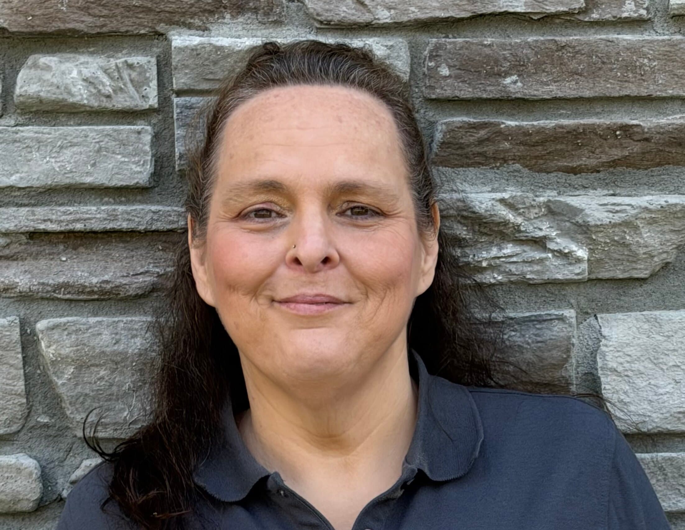 Ms. Regina Olsen