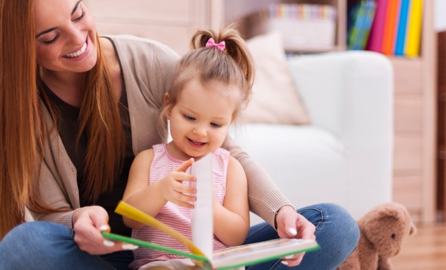 Mother and her daughter spend quality time reading together