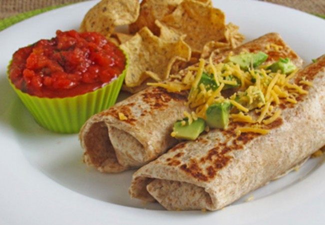 Zucchini bean and cheese burritos served with salsa and chips