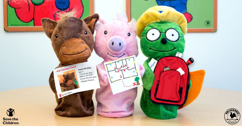 Primrose puppets hold an ICE contact card, emergency maze game and an emergency supplies backpack