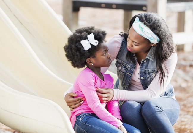 mom teaching daughter truth for kids while on the playground