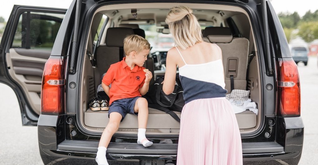 Primrose Schools mom with son after school in car